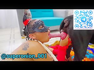 Masked latina sucking two dogs